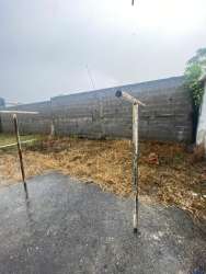 Basic utility room with sink and window inside house Vacamonte Panama