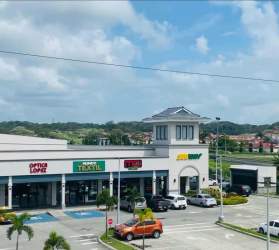 Aerial photo showing retail spaces, parking lot and surroundings in Colon, Panama