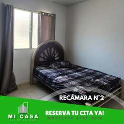 Cozy minimalist bedroom with window and tiled flooring Penonomé