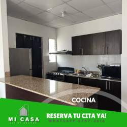 Kitchen with granite countertop appliances tile backsplash Penonomé