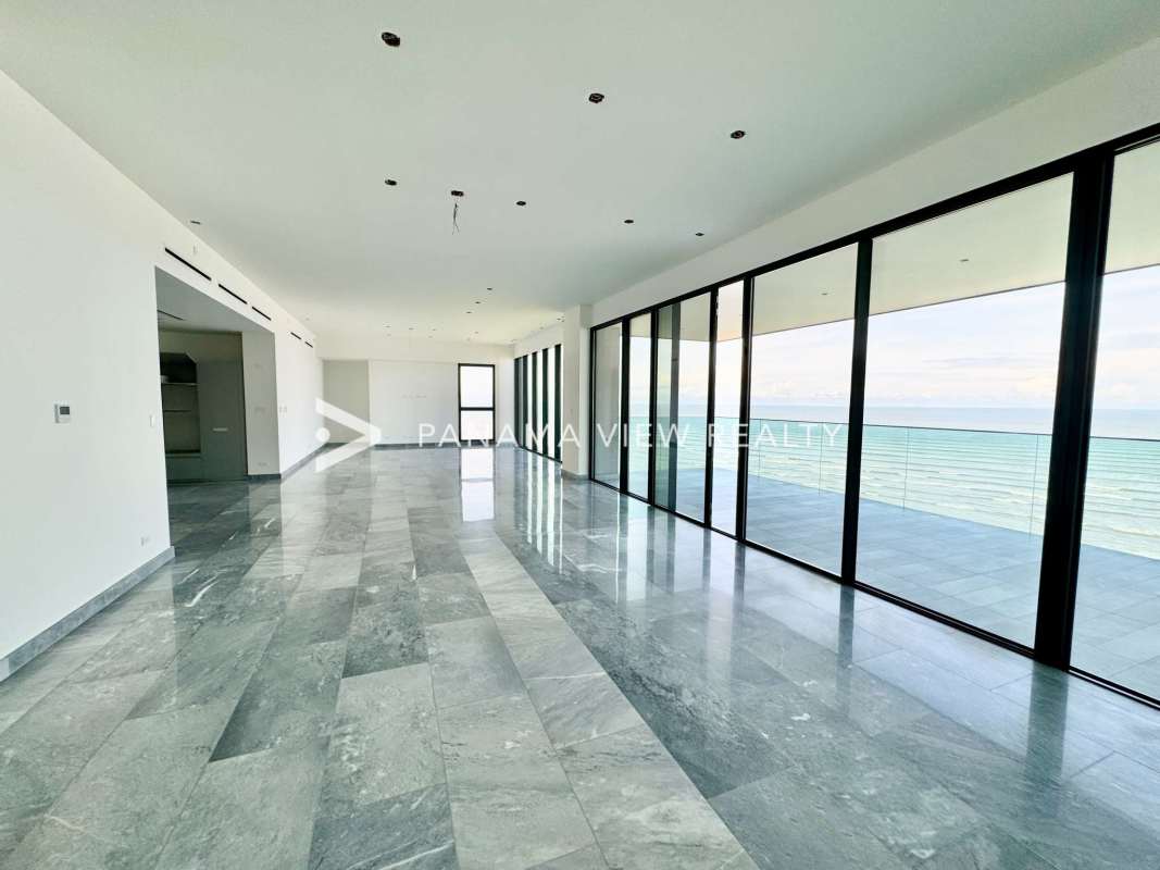 Modern kitchen with marble counters, stainless steel appliances Upper East Costa del Este Panama apartment