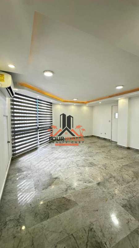 Outdoor pool deck in PH Vista Tower with city views