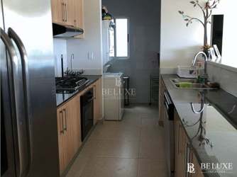 Bedroom with built-in closet, AC, and garden views in Bijao Beach Resort Panama