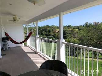 Infinity swimming pool area facing the Pacific at Bijao Beach Residences Panama
