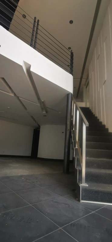 Interior staircase inside multi-story corporate building Costa del Este Panama