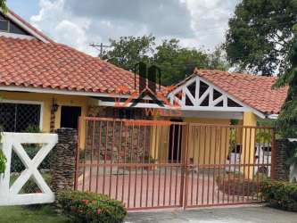 Bright living room with ceramic tile floor opening to garden veranda, Club Ecuestre Coronado Panama house sale