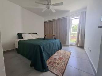 Landscaped gardens and children's playground in Nueva Gorgona beach residential community Panama