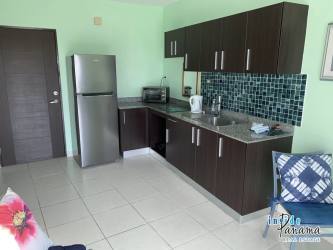 Balcony overlooking the ocean with seating in PH Las Olas La Barqueta Panama