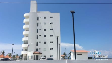 Beachfront swimming pool with lounge chairs at PH Las Olas La Barqueta Alanje Panama