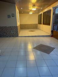 Covered terrace patio with ceiling fans, tile floors at Arboledas Los Castaños La Chorrera Panama
