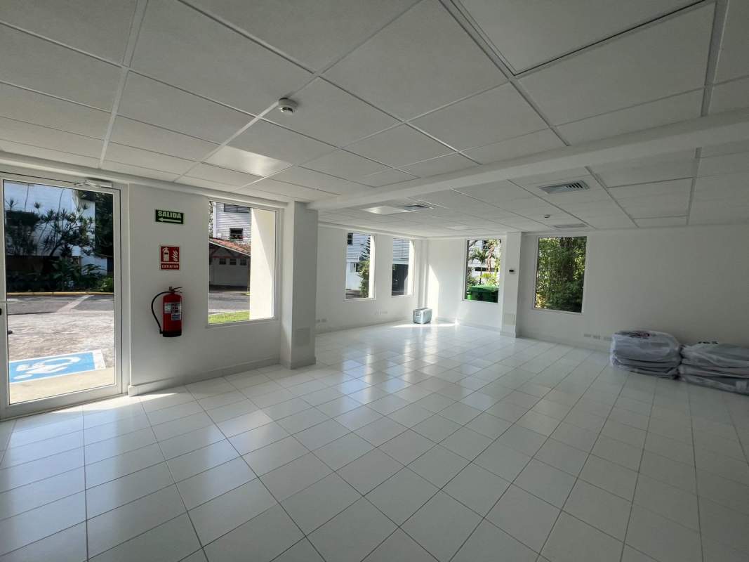 Glass-walled conference room with bright interior at Quarry Heights Ancón Panama