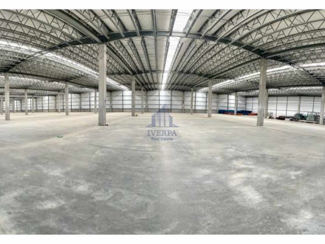 Large empty warehouse interior with skylights mezzanine reinforced flooring Don Bosco Panama