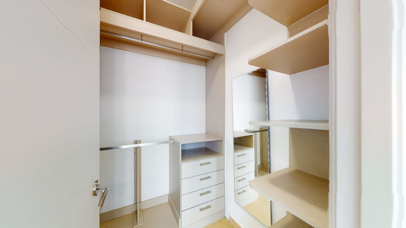 Bedroom featuring floor-to-ceiling windows with ocean city views in PH Sky Panama City