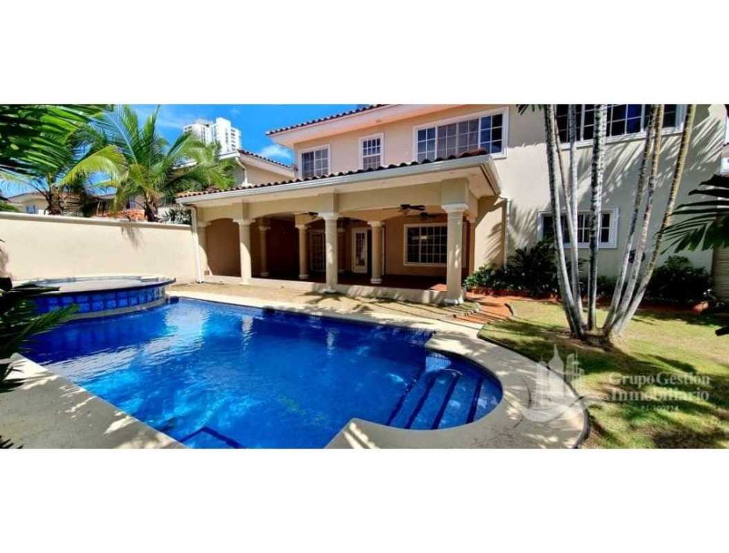 Shaded terrace overlooking pool and garden luxury Costa Azul home Panama