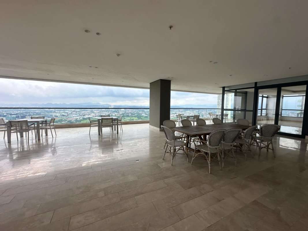 Expansive balcony terrace with city skyline and golf course views PH Albatross Santa Maria Panama