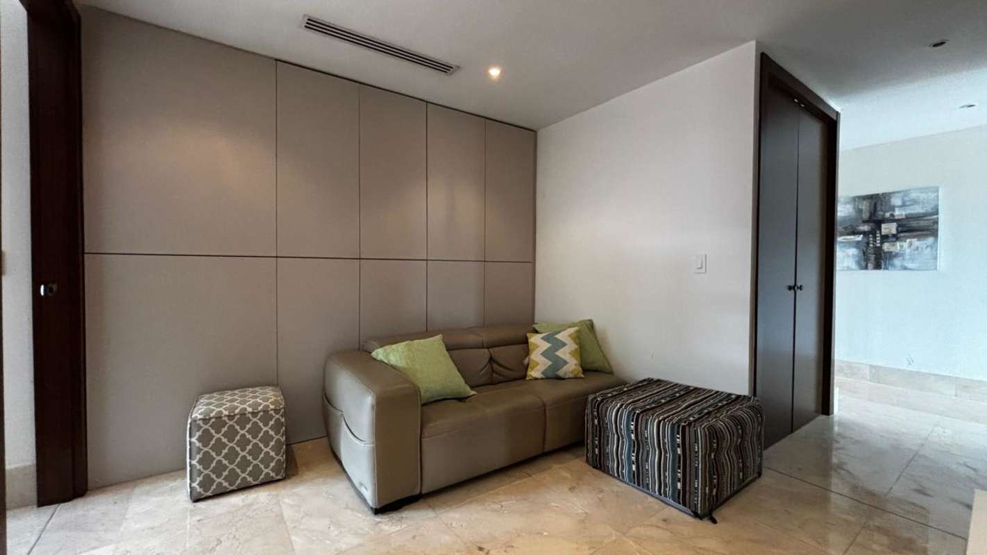 Luxury bathroom with marble tile walk-in glass shower double sinks in Santa Maria Panama