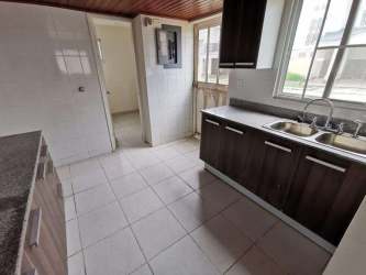 Bright living room with tile floor and windows PH Playa Mar Playa Dorada Panama