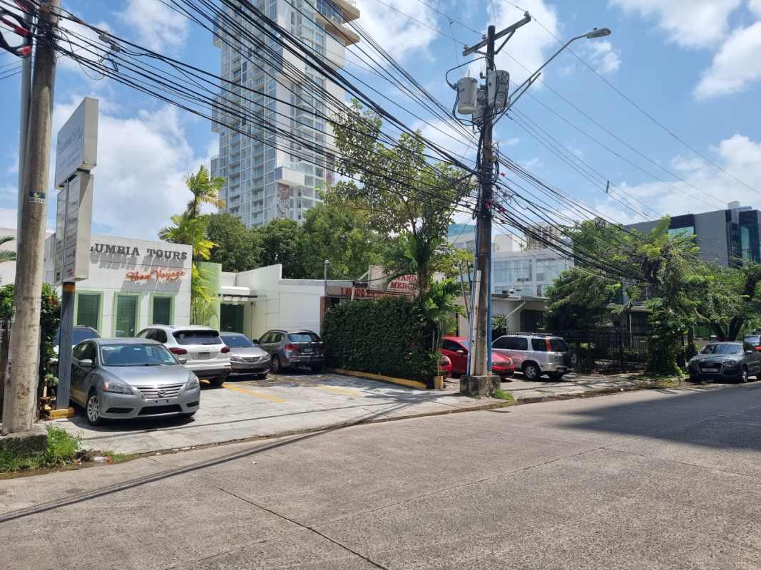 City street view with commercial and residential properties in Obarrio Panama for sale