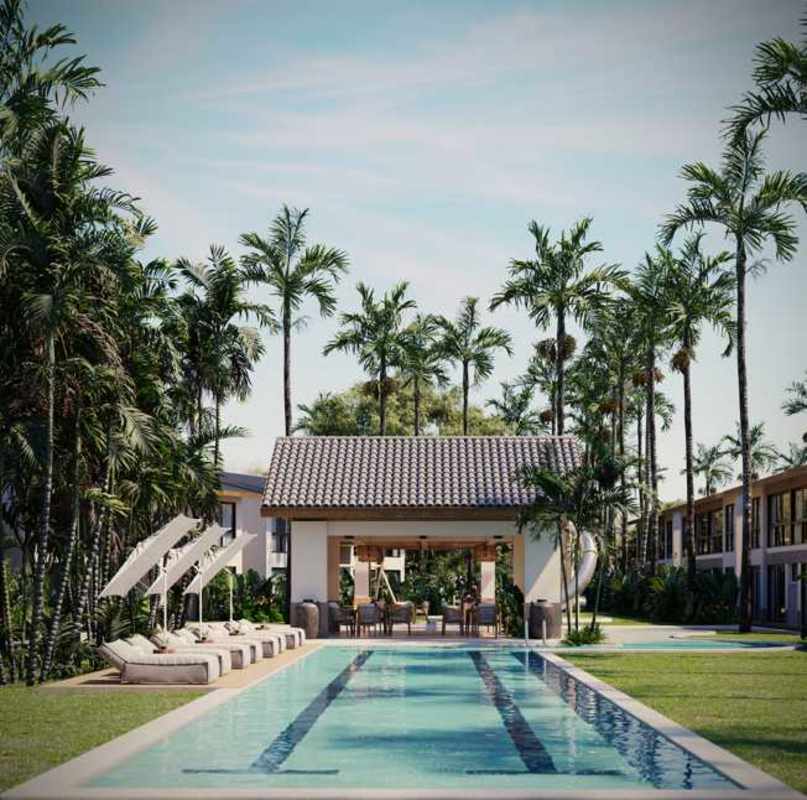 Resort-style infinity swimming pool and sun deck in Playa Caracol Panama