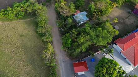 Aerial of tropical property with existing small house near Playa Las Lajas Panama