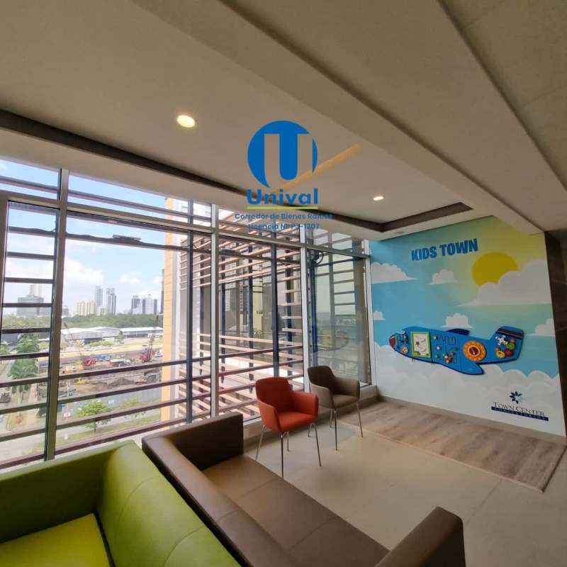 Colorful kids waiting/play space inside Town Center Costa del Este near medical offices Panama