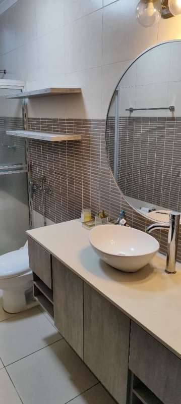 Contemporary bathroom with vessel sink, glass shower in PH Waterview San Francisco Panama City