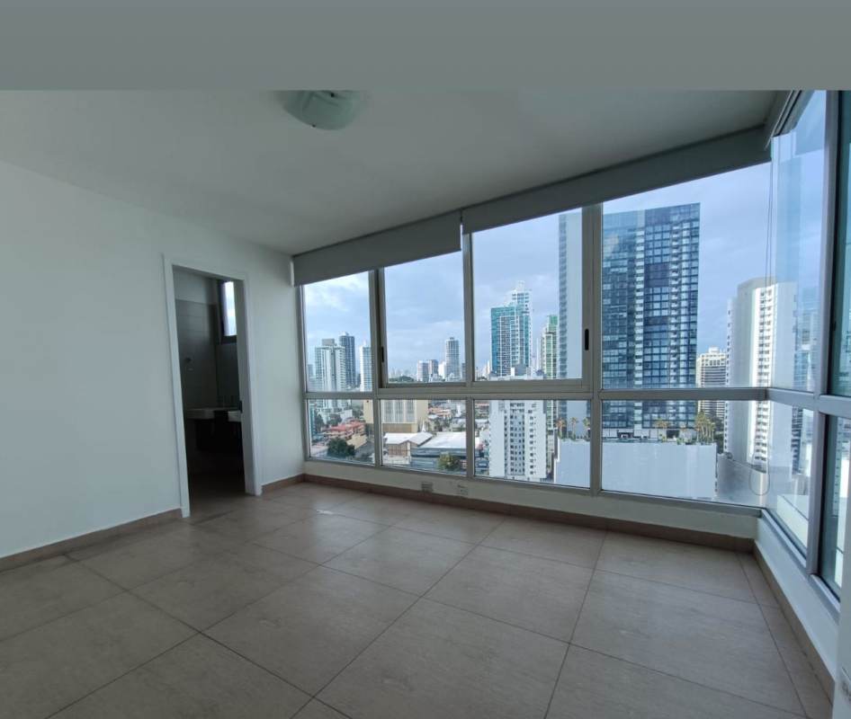 Modern living room with floor-to-ceiling windows and stunning ocean views in PH BICSA Panama