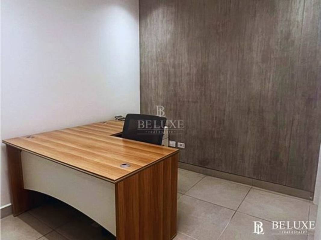 Minimalist reception desk with partition glass modern lobby Dorado City Center Panama City