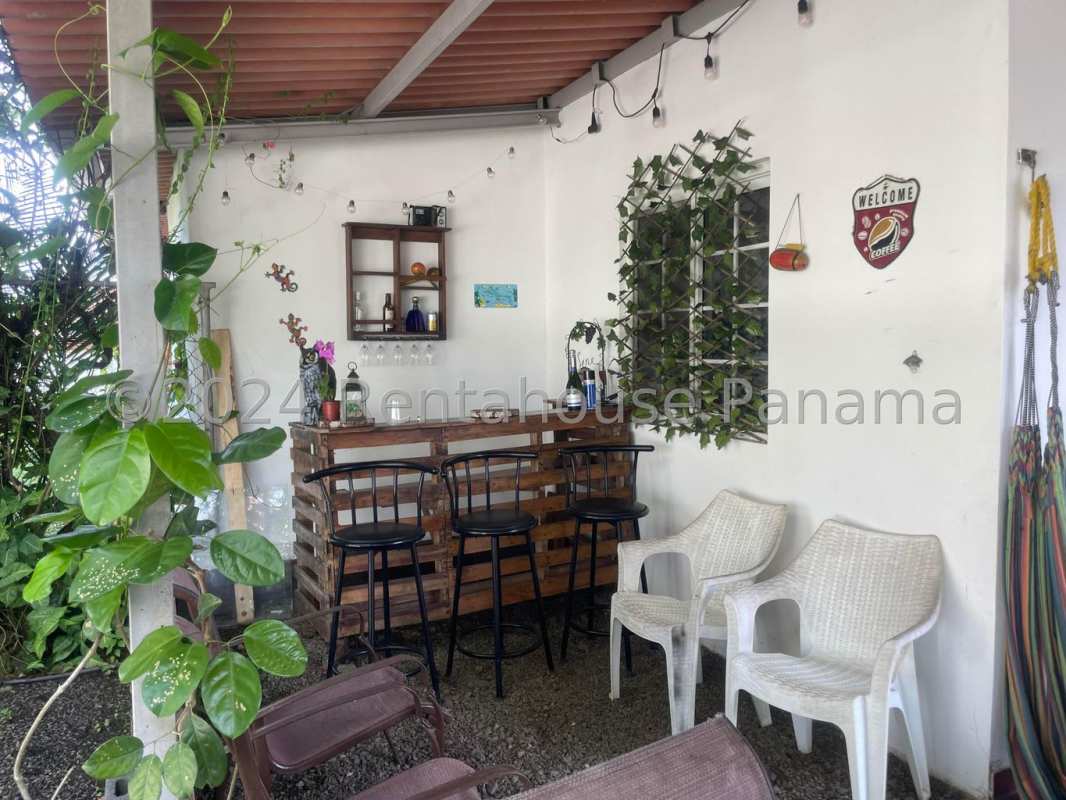 Spacious master bedroom with balcony access in gated community Las Cumbres