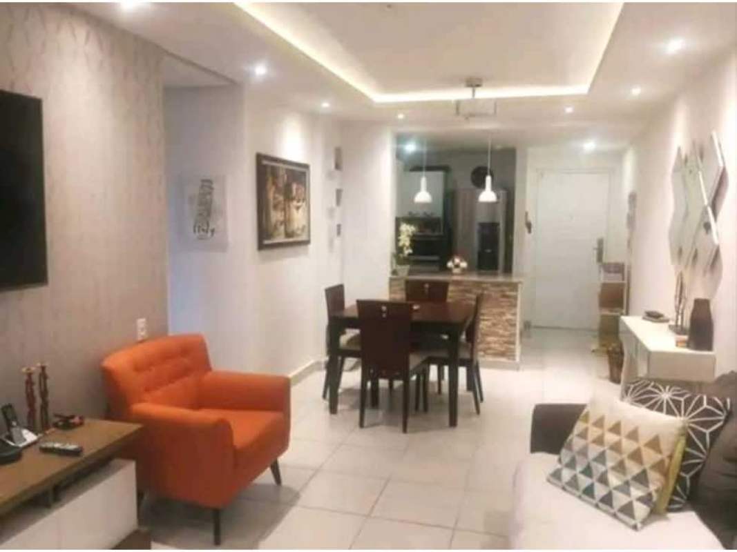 Indoor lounge area with tables, chairs, glass wall at PH Lefevre 75 Panama