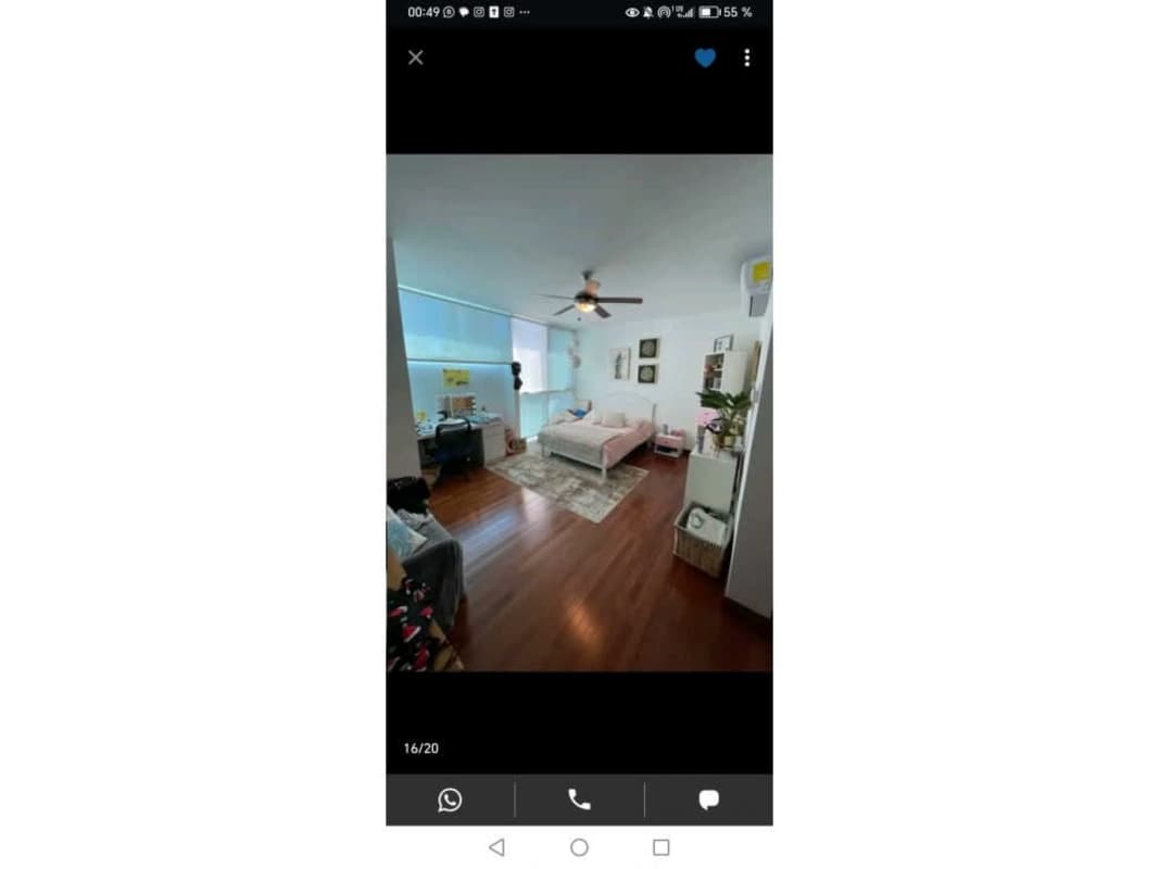 Outdoor kitchen with granite counter, stainless grill, mini fridge, pendant lights in Altos del Golf San Francisco