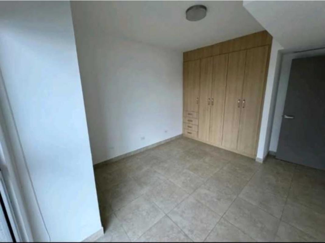 Minimalist bedroom with closet and ceramic floors in PH BICSA Tower Panama City