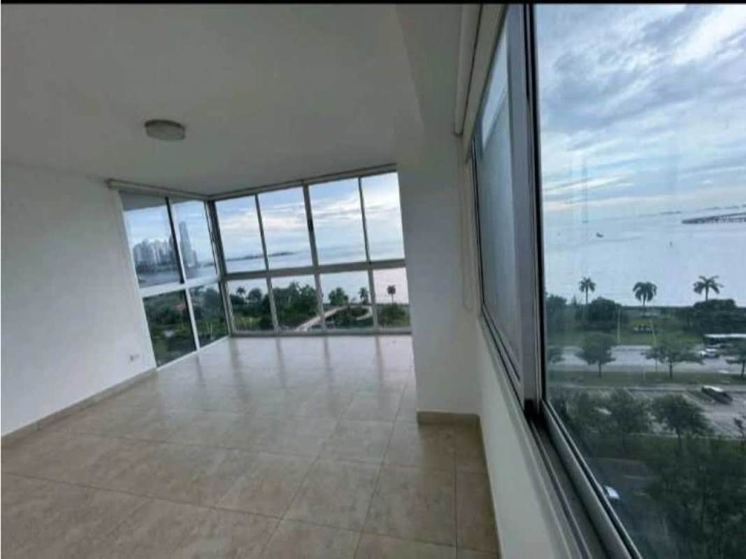 Living room with floor-to-ceiling windows and panoramic ocean views in PH BICSA Tower Panama