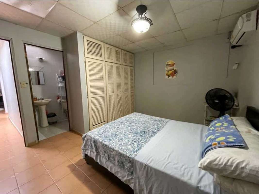 Bedroom with ensuite bathroom AC wardrobe tiled floor cartoon decoration investment Panama