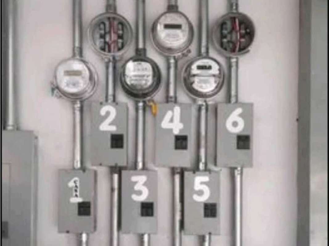 Wall of electric meters and breaker boxes investment rental Panama