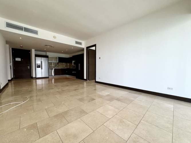 Open living and dining area with panoramic floor-to-ceiling windows in Pacific Sky Punta Pacifica