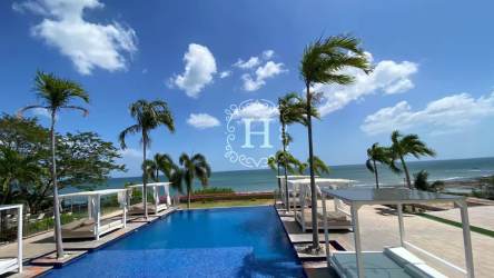 Spacious balcony with glass railing offering panoramic Pacific Ocean views at Royal Palm San Carlos Panama