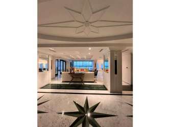 Modern enclosed sunroom with panoramic ocean views in luxury Punta Paitilla Panama apartment