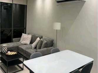 Bright bedroom with closet and large window in PH Coco Place furnished rental