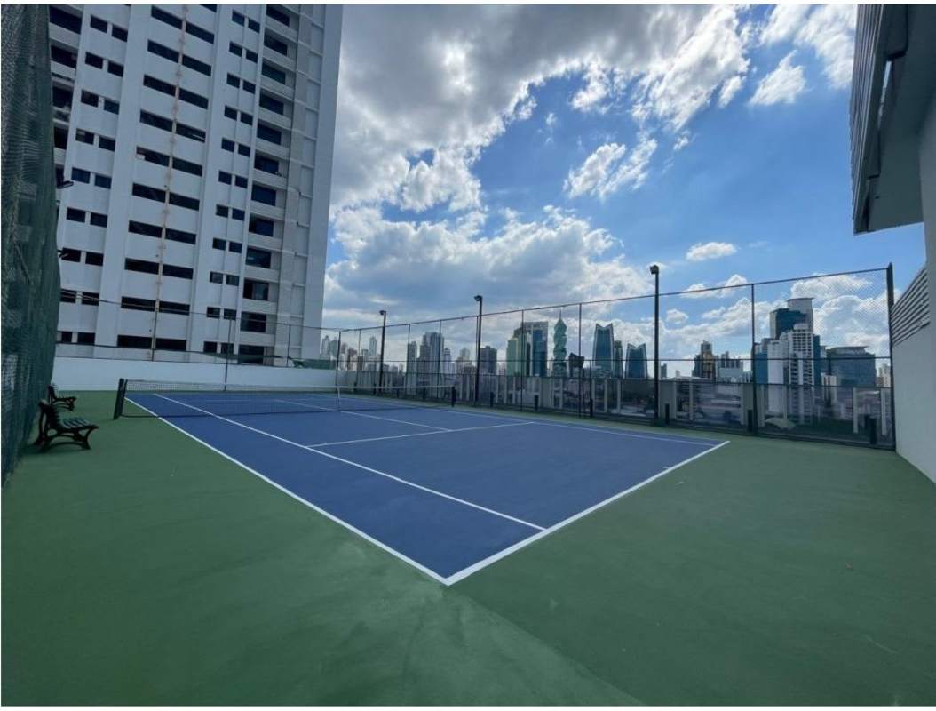 High-rise gym with panoramic windows and fitness equipment at PH The Towers 50 San Francisco Panama