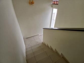 Indoor tiled staircase half wall railing Villas de Arraiján Panama Oeste