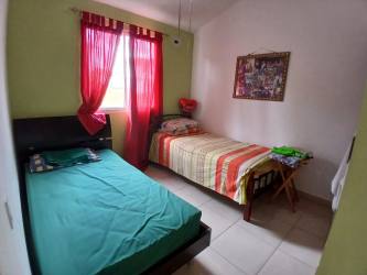 Small bedroom with two beds AC tile floor Villa de Arraiján Panama