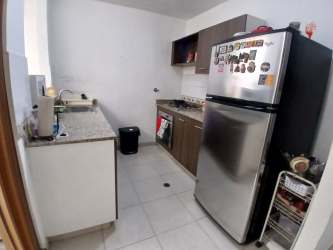 Equipped kitchen with refrigerator, granite countertop Villas de Arraiján Panama
