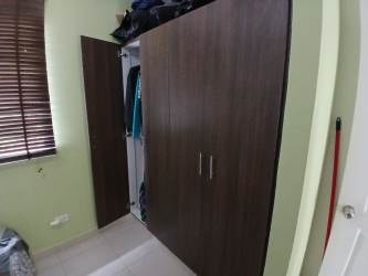 Bedroom includes closet window blinds natural light Villas de Arraiján Panama