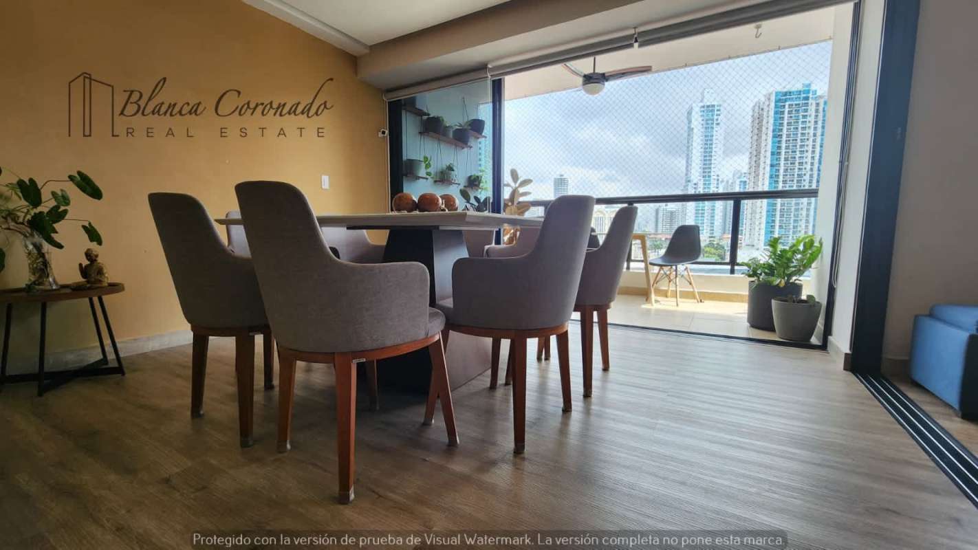 Dining space with panoramic ocean and skyline views in PH Balboa Bay Panama City