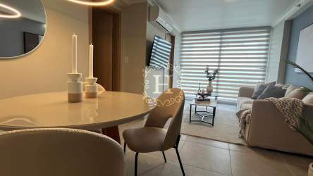 Open plan dining area overlooking terrace and Pacific Ocean El Palmar beachfront condo Panama