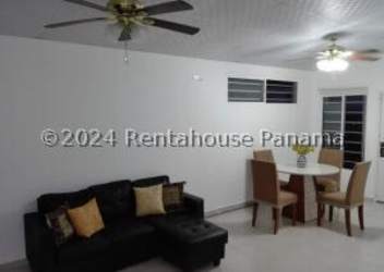 Bedroom with tile floor, white walls, and window in rental house Vista Alegre Panama