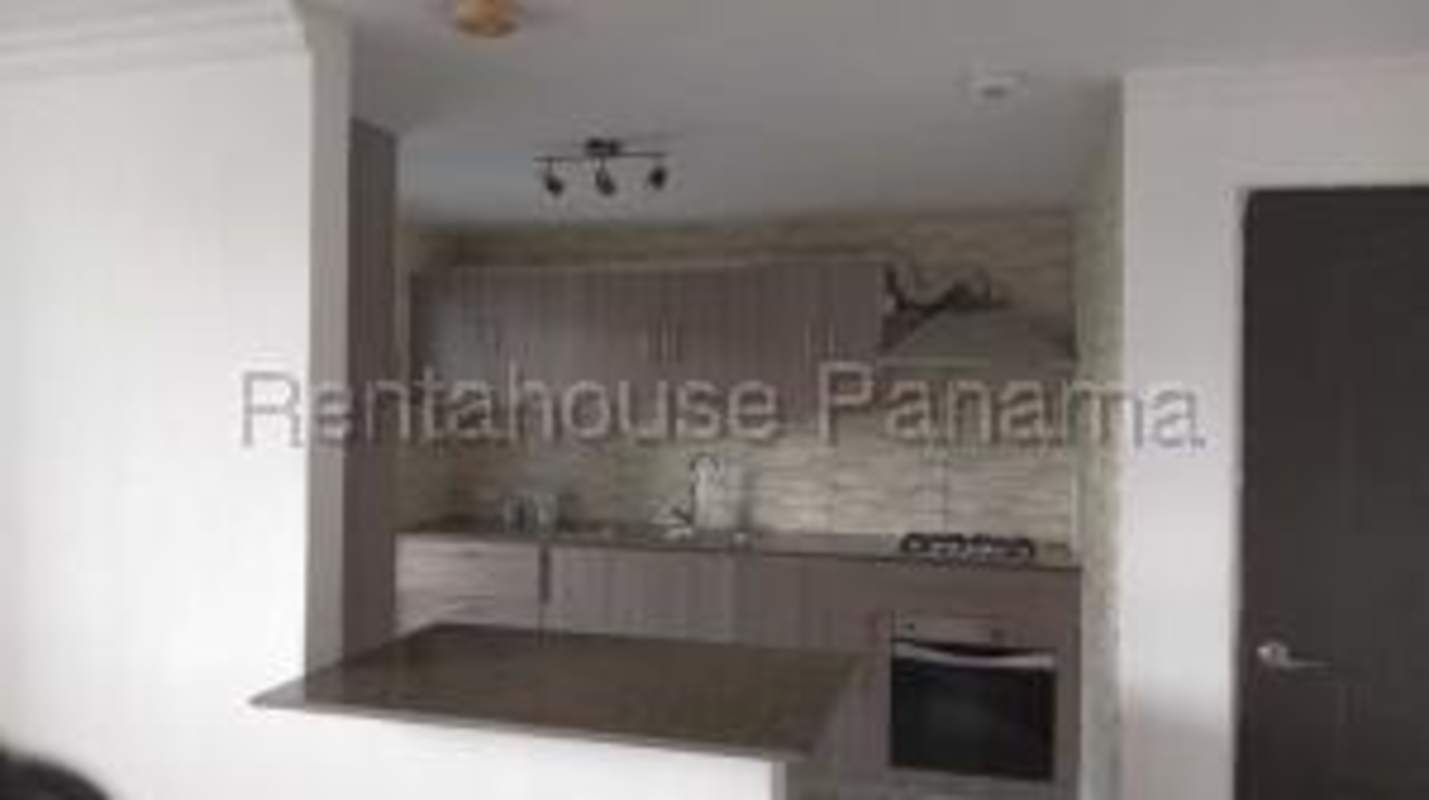 Bedroom with large window in apartment for sale in San Francisco Panama
