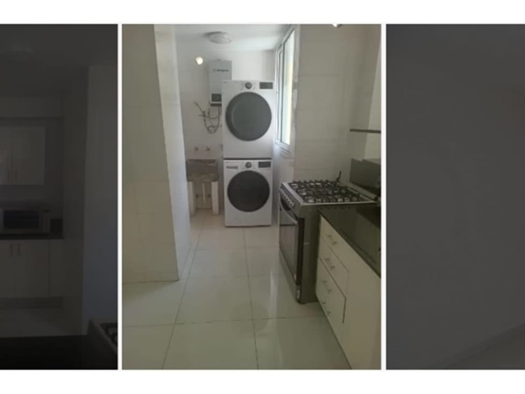 Bright secondary bedroom with AC unit, large window, and neutral tones PH Bela Vita Panama