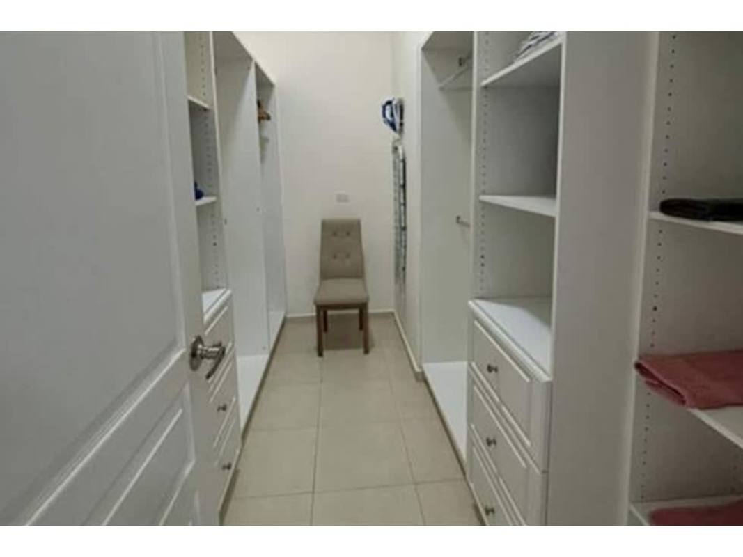 Spacious walk-in closet with built-in storage Vista del Mar apartment Panama